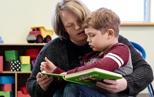 mom-reading-to-son