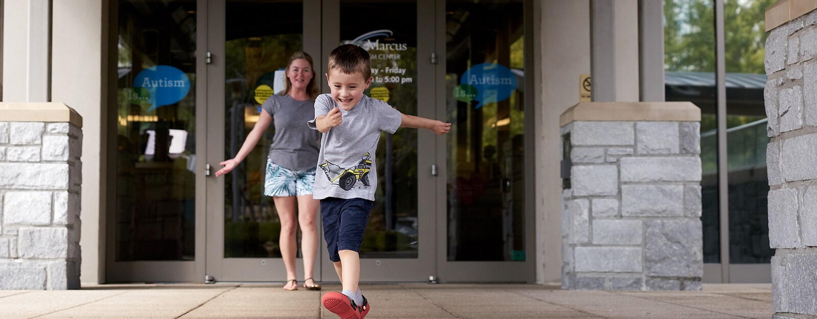 boy at marcus autism center skipping