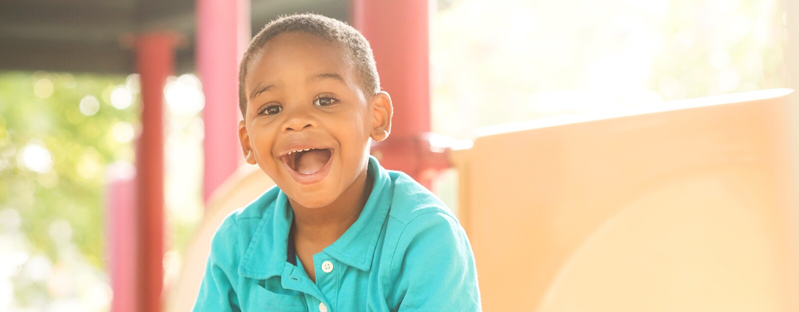 boy on marcus autism center playground