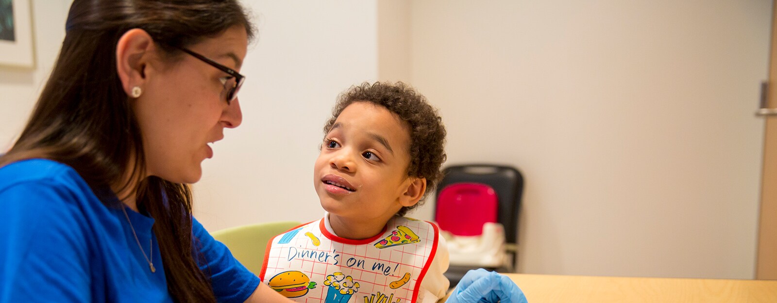 boy in high chair at marcus autism center