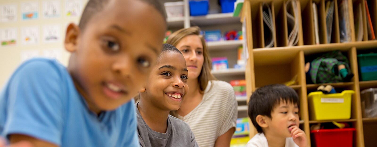 boys in classroom with teacher